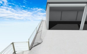 傾斜地に3連棟のイナバガレージ